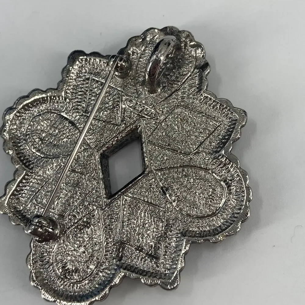 Avon tribal clip on earrings and brooch set